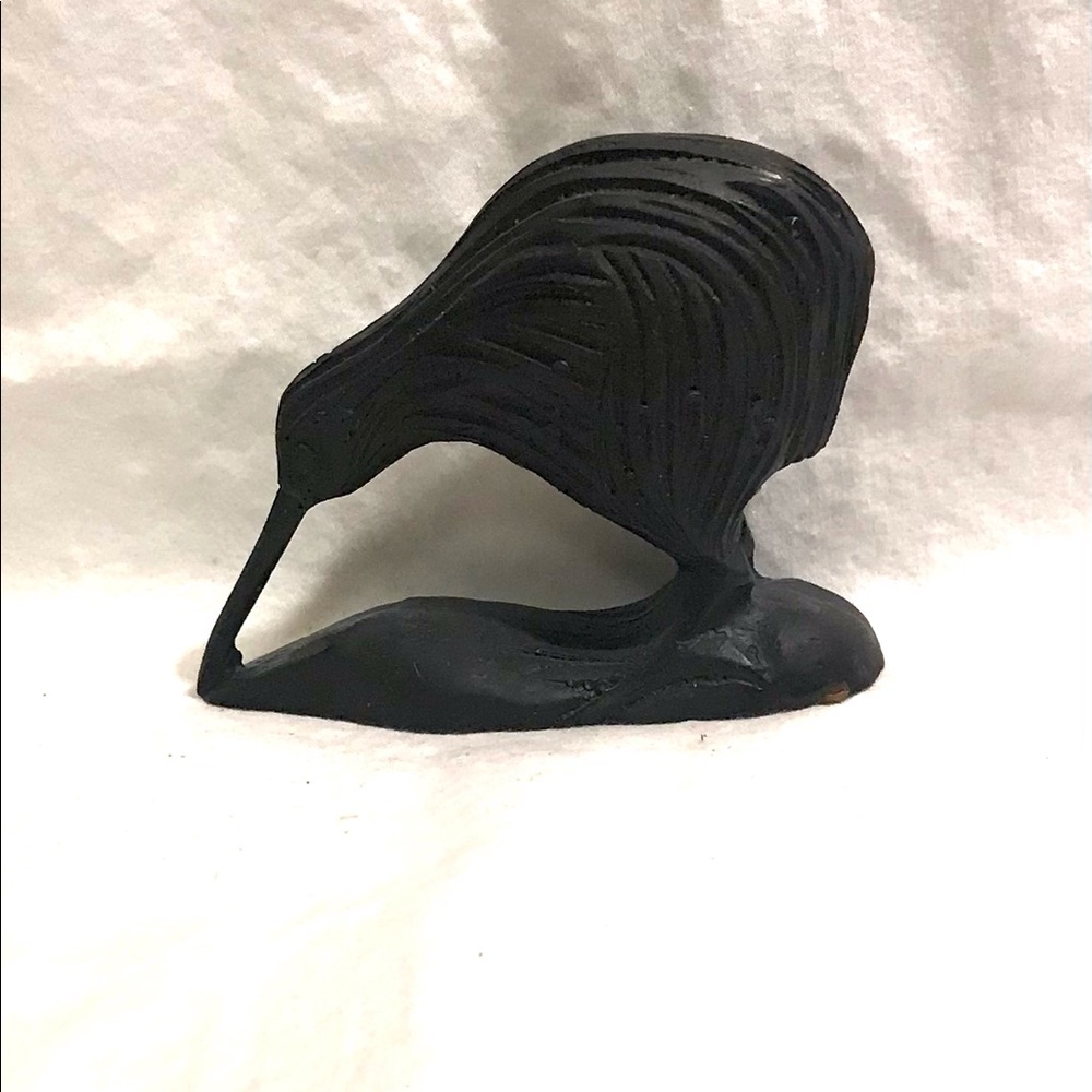 A Hand Carved Wooden Kiwi Bird.
